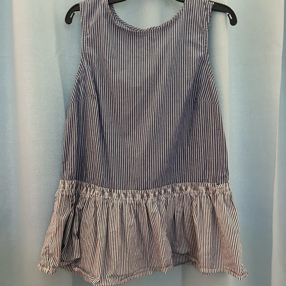 Stripe peplum style sleeveless top